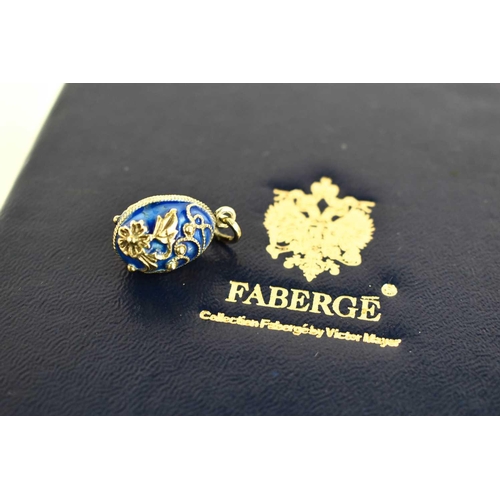 172 - A Faberge enamel and silver egg form pendant, from the Victor Mayer collection, in the original box.