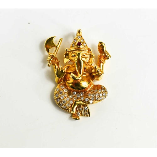 177 - A 22ct gold Ganesh pendant in the form of a seated elephant holding an axe, set with diamonds and ru... 