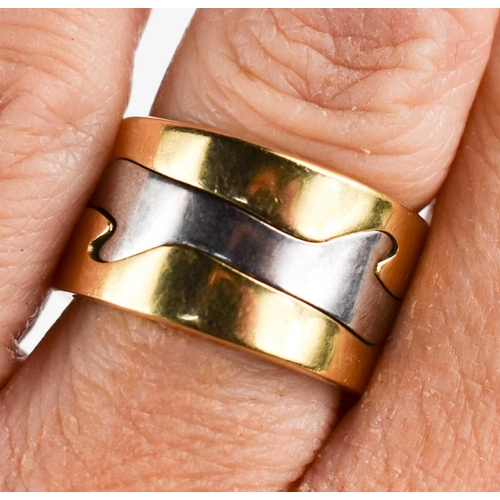 20 - A Georg Jensen 18ct gold Fusion ring by Nina Koppel, the three-parts in yellow and white gold, stamp... 