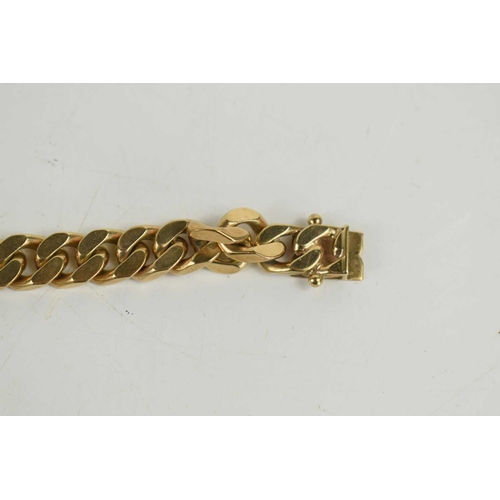 21 - A 9ct gold curb link bracelet, 50.8g.