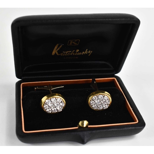 22 - A pair of 18ct gold and diamond cufflinks by Kutchinsky, each of oval form, set with ten diamonds, l... 