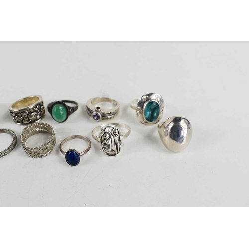 230 - A group of twenty two Sterling silver rings, including a dress ring set with three coloured stones, ... 