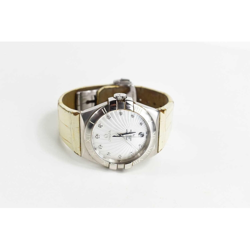 275 - A lady's Omega Constellation Automatic wristwatch, the signed sunburst silvered dial with diamond po... 