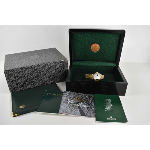 281 - A lady's Rolex Cellini 18ct gold Oyster Perpetual Datejust wristwatch, the signed black dial with di... 