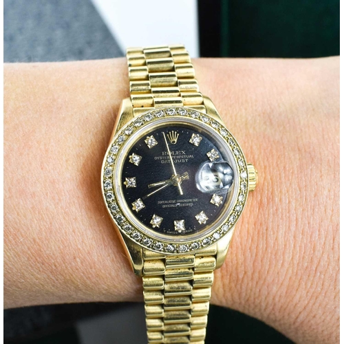 281 - A lady's Rolex Cellini 18ct gold Oyster Perpetual Datejust wristwatch, the signed black dial with di... 