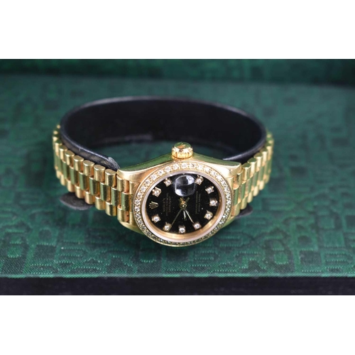 281 - A lady's Rolex Cellini 18ct gold Oyster Perpetual Datejust wristwatch, the signed black dial with di... 