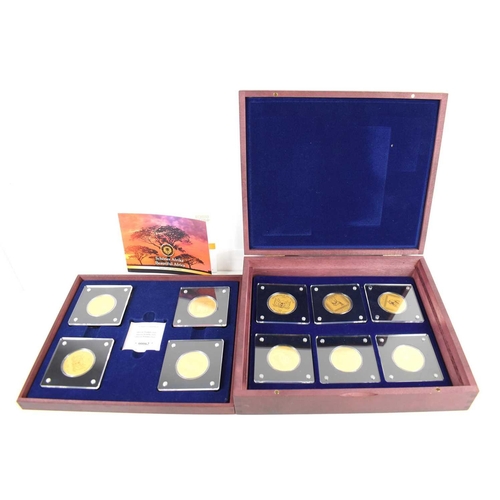 306 - A boxed set of 24ct gold coins, celebrating African Wildlife in their original case with certificate... 