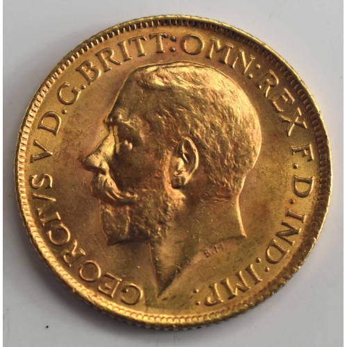 313 - A George V full gold sovereign, dated 1915.