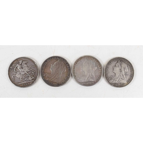 321 - Four Queen Victoria silver crowns dated 1893, 1897, 1894 and 1889.