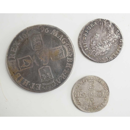 327 - Three William III silver coins comprising of a full crown dated 1696 and a shilling and sixpence.