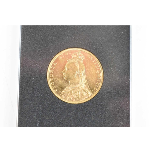 339 - A Victorian gold sovereign, dated 1892, in its capsule, with presentation box and outer box and cert... 