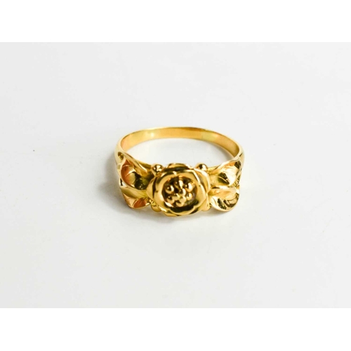 60 - A Georg Jensen 18ct gold ring intricately modelled as a flower with leaves of Art Nouveau form, size... 
