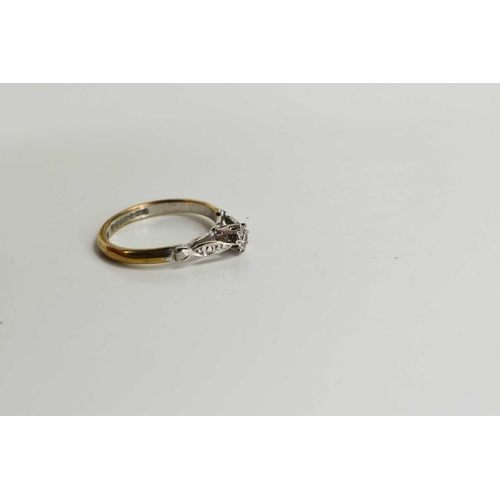 63 - A 9ct gold, platinum and diamond solitaire ring, size P, 2.6g.