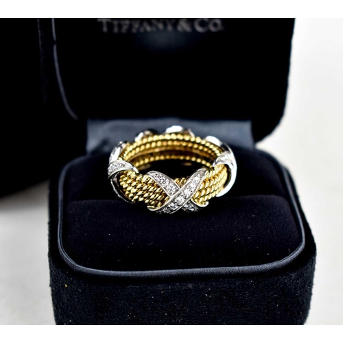 65 - A Tiffany & Co by Schlumberger Studios 18ct gold and diamond ring, composed of four yellow gold rope... 