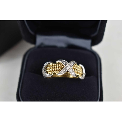 65 - A Tiffany & Co by Schlumberger Studios 18ct gold and diamond ring, composed of four yellow gold rope... 