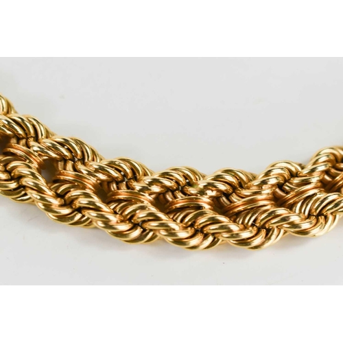 66 - A 14k gold double ropetwist necklace, graduated style, with slide clasp, 47g, 39cm long.