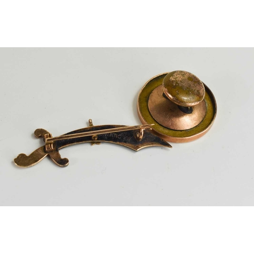 76 - A gold brooch in the form of an Indian sword, engraved verso to H A Cummings, unmarked but testing a... 