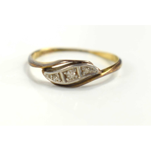 88 - An Art Deco, 18ct gold, platinum and diamond illusion set ring, the curved leaf setting with three s... 
