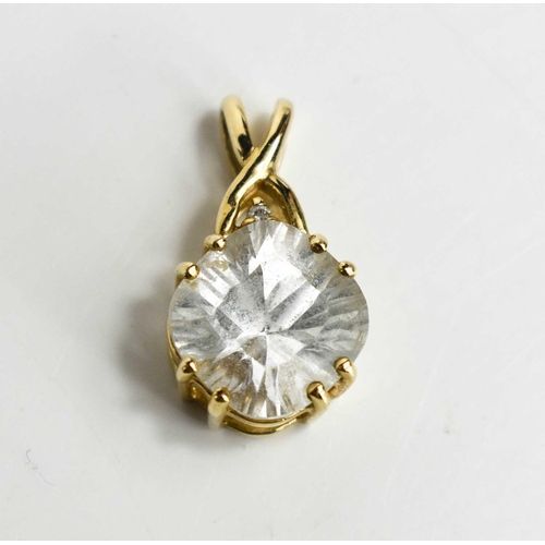 93 - A glacier topaz and diamond pendant, the topaz of approximately 10.7mm diameter, with diamond brilli... 