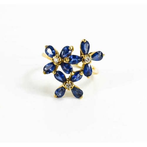 94 - A 9ct gold, sapphire and diamond multi-flower ring, size N½, 4.45g, with certificate of authenticity... 