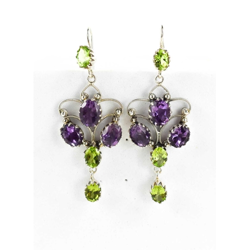 95 - A pair of silver, amethyst and peridot set earrings, of floral form, 6½cm long.