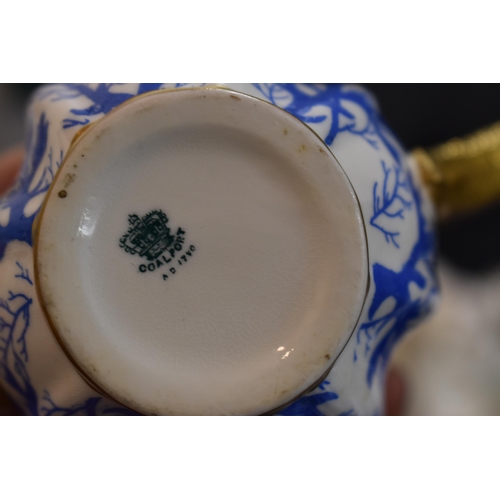 287 - A 19th century Coalport part coffee set, decorated with blue coral and gilded handles and rims.