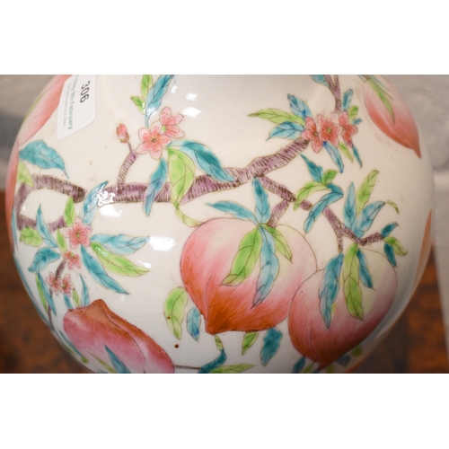 306 - A 19th century Chinese bottle form vase, depicting peaches and bats, 34cm high.