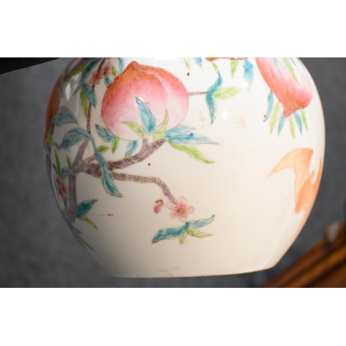 306 - A 19th century Chinese bottle form vase, depicting peaches and bats, 34cm high.