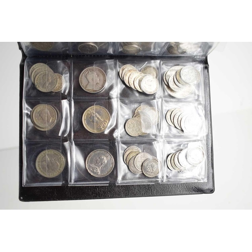 100 - An album of mostly British silver coins to include Queen Victoria shillings, Florins and others.