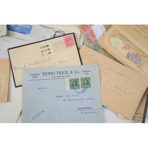 150 - A large collection of stamped envelopes, Victorian and later, together with a small quantity of loos... 