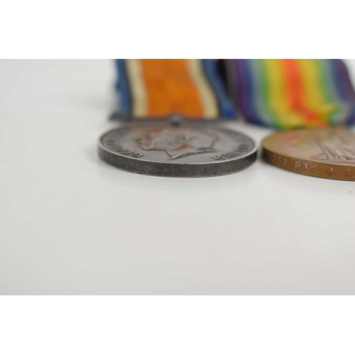 16 - A group of two WWI medals awarded to PTE J. Canham, Bedf.R. number 19737, comprising the Victory Med... 