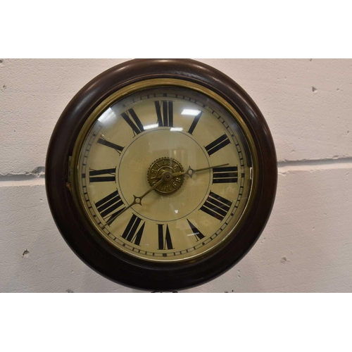 170 - An Edwardian mahogany wall clock, with weights and dedication engraved pendulum dated 1909.