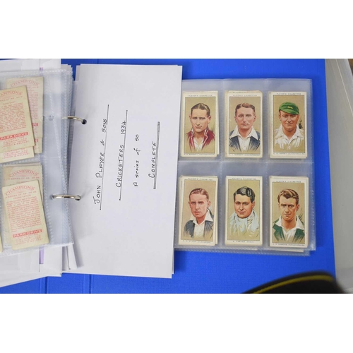 239 - Two albums of cigarette cards to include Carreras Cricketers, John Player avery and cage birds, Nest... 