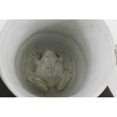 270 - A late 19th century Staffordshire pearlware frog loving cup, the interior with toad to the base, the... 