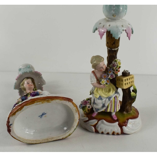 272 - A pair of 19th century Sitzendorf porcelain candlesticks, of figural form, each with a young girl to... 