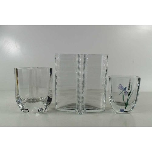 277 - Three glass / crystal vases, one by Kosta Boda, one by Sea of Sweden, hand painted with a dragonfly ... 