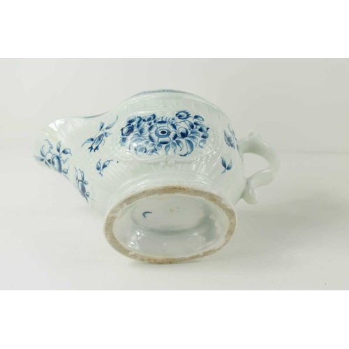 295 - A First Period Worcester blue and white sauce boat, with blue crescent moon mark to the base.