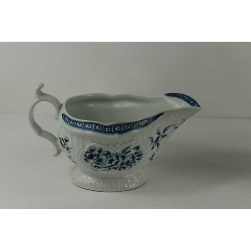 295 - A First Period Worcester blue and white sauce boat, with blue crescent moon mark to the base.