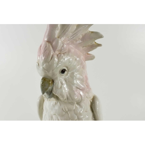 316 - A Czechoslovakian Royal Dux porcelain cockatoo figurine, 41cm high.