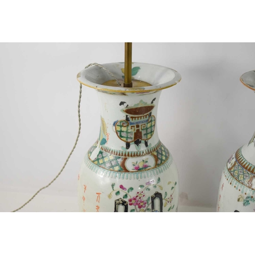 319 - A pair of 19th century Chinese vases, converted to lamps, the enamel decoration depicting flowers, C... 