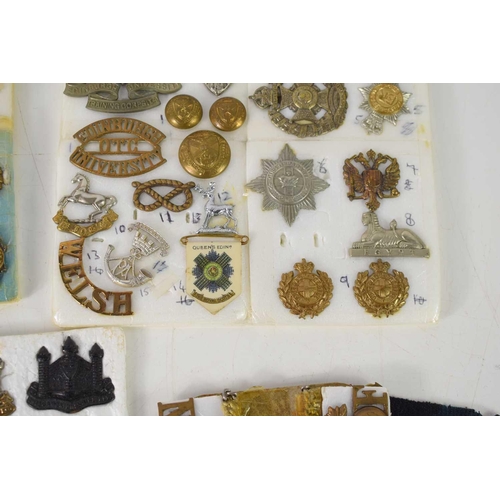 37 - A group of cap and collar badges, including a pair of WWI, Northumberland Fusiliers badges, with ide... 