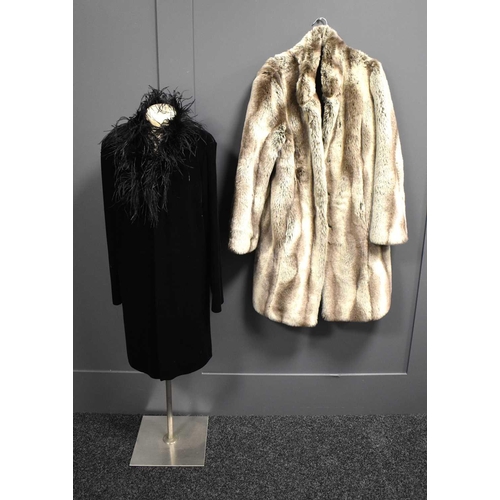 472 - An Olsen faux fur coat, in tones of mushroom and fawn, size 16, and a J. F. W. ostrich feather trimm... 