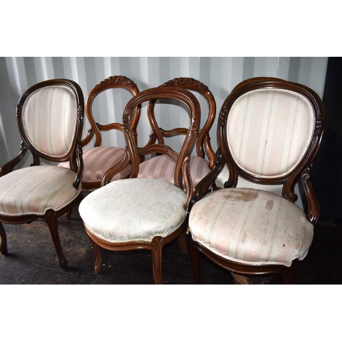 514 - A group of Victorian balloon back chairs, some with carved backs, in cream and pink fabrics.