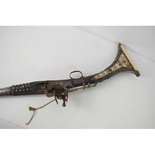 81 - A 19th century Ottoman flintlock long bore rifle, Black Bess rifle action, having bone inlaid decora... 