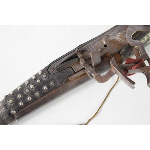 81 - A 19th century Ottoman flintlock long bore rifle, Black Bess rifle action, having bone inlaid decora... 