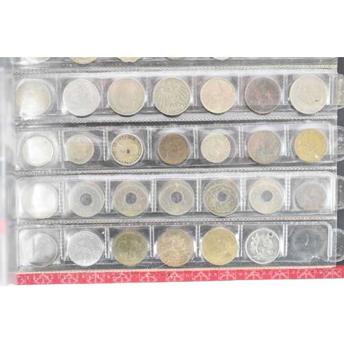 100a - Three coin albums containing GB and worldwide coins, some silver, to include a George III 1797 cartw... 