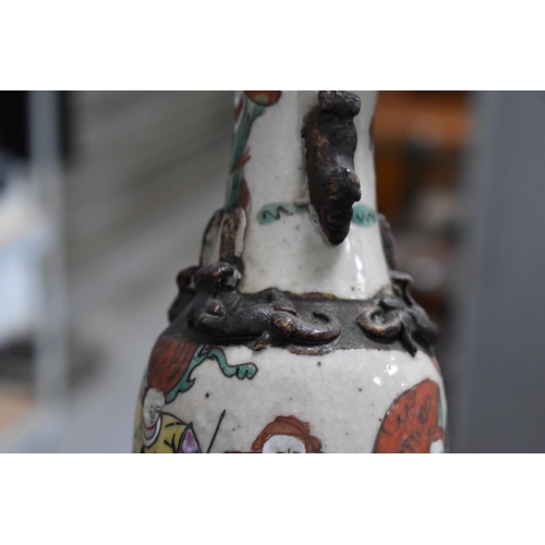 323 - A selection of Chinese pottery, to include three graduated stoneware glazed cylindrical vases depict... 