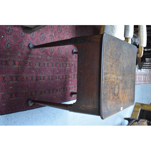 534 - A 17th century oak lowboy, with three short drawers to the front, raised on tapered legs with pad fe... 