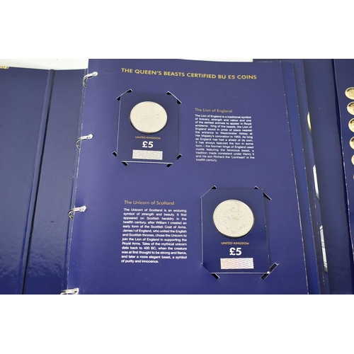 Three change checker albums containing 10p, one pounds, 50p and The ...