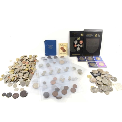 64 - A large collection of GB and worldwide coinage, to include commemorative crowns, some silver coins, ... 